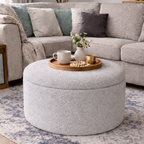 Ashfield ottoman in pewter grey in a modern living room setting with coloured cushions and a decorative ottoman tray