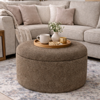 Sand Boucle storage pouffe with a decorative tray on top all in a modern living room setting