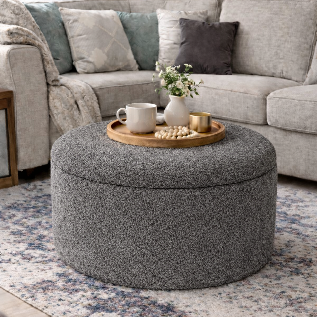 Ashfield ottoman in charcoal boucle in a modern living room setting