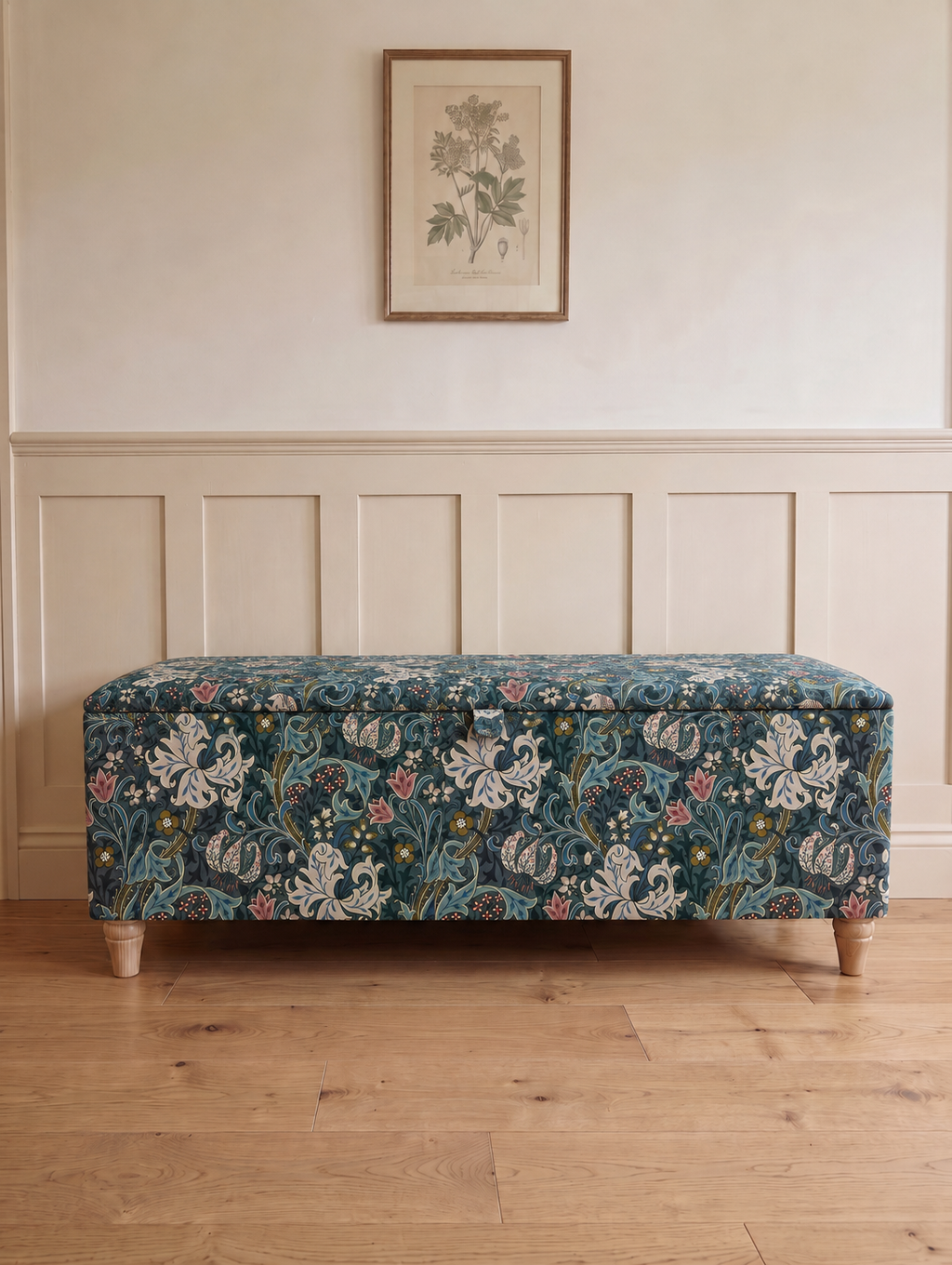 William Morris Golden Lily Blue Ottoman in a Hallway with wooden floors and panelled walls