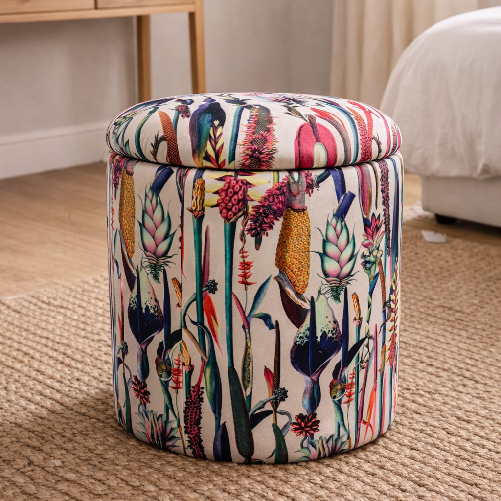 Decorative ottoman with colorful floral pattern in a room setting.