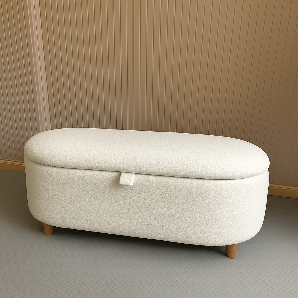 White oval storage bench with wooden legs on a neutral background