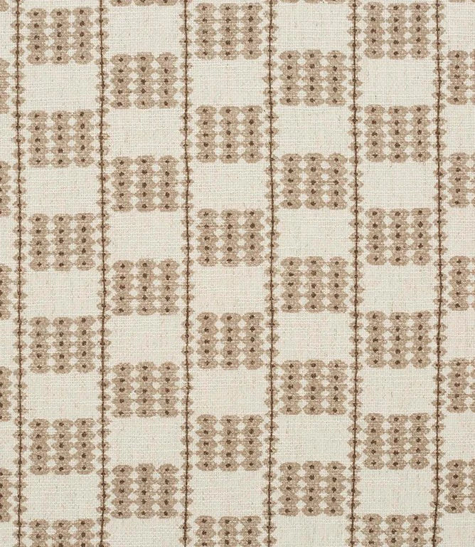 A close-up of a iLiv Flint fabric with a repeating geometric pattern in taupe brown on a warm off-white background.
