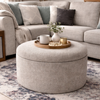 Storage ottoman in truffle boucle in a modern living room setting