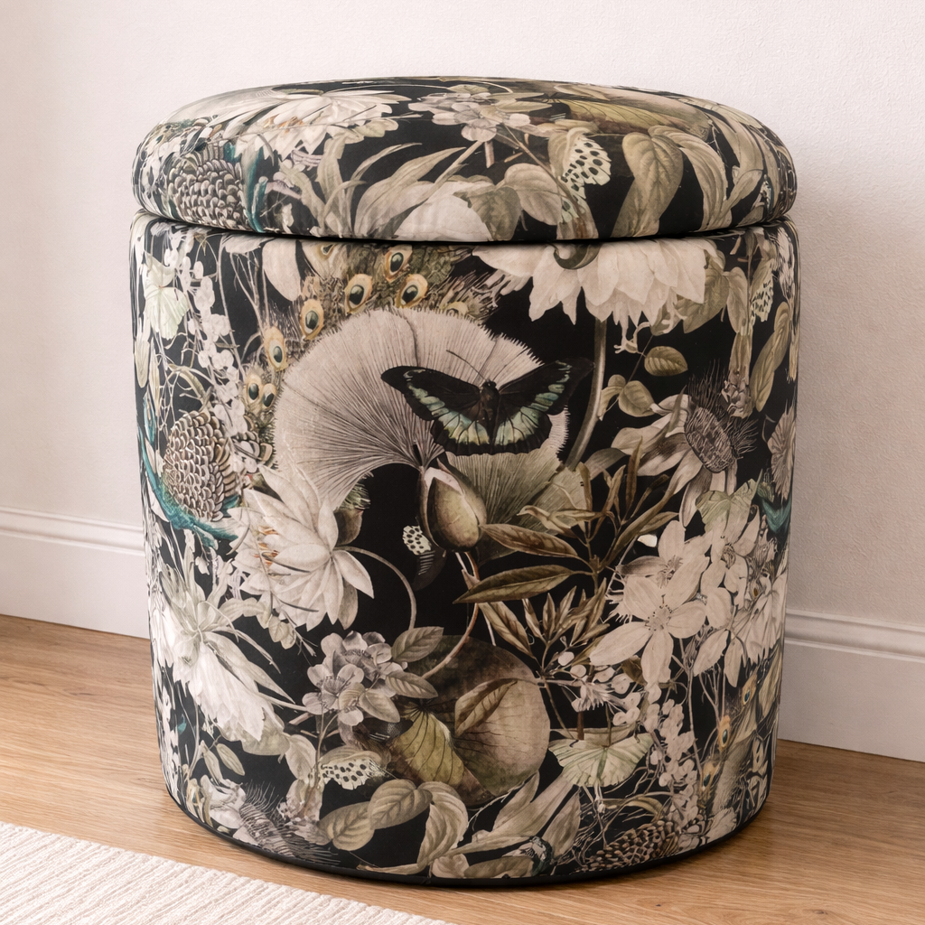 Decorative ottoman with floral and animal pattern on a wooden floor.
