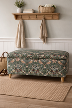 William Morris Strawberry thief patterned storage bench in a room with a wooden shelf and rug.