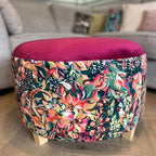 circular living room footstool coffee table in bold floral velvets with cerise pink velvet top