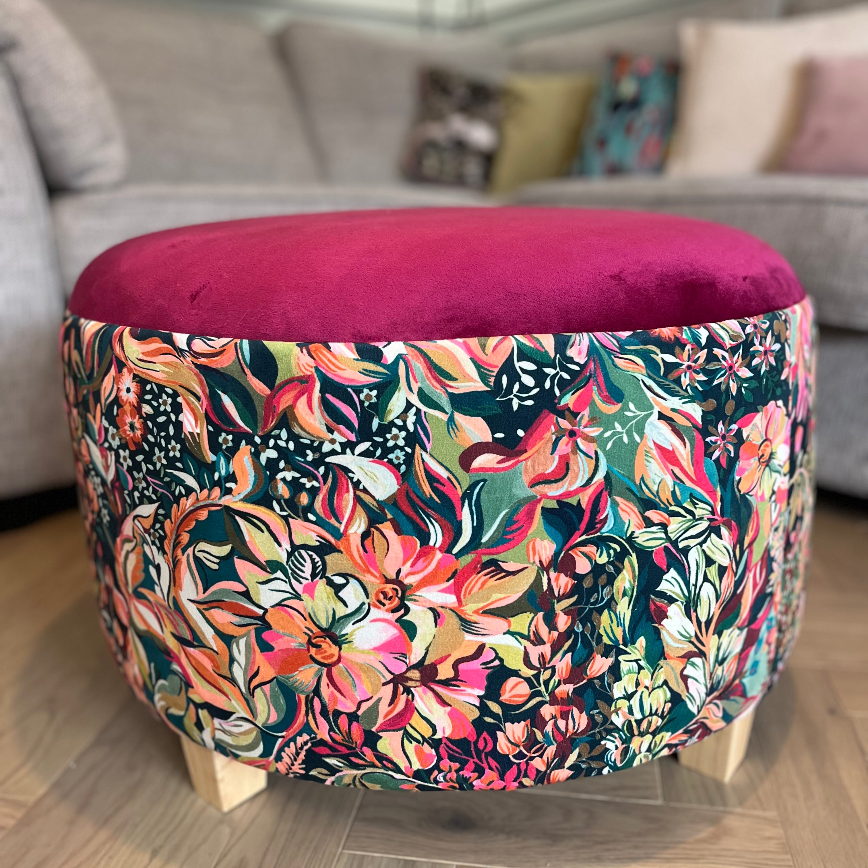 circular living room footstool coffee table in bold floral velvets with cerise pink velvet top