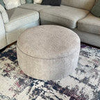 large round storage coffee table upholstered teddy boucle soft fabric