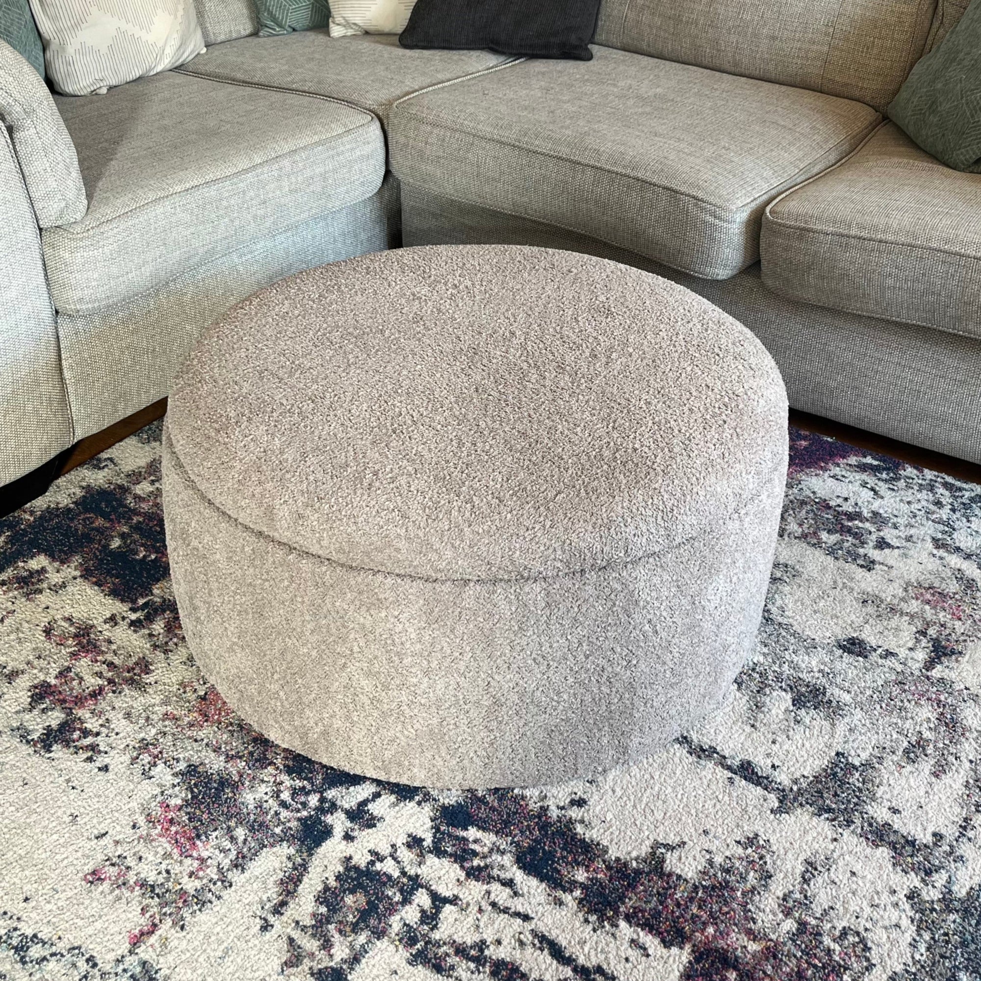large round storage coffee table upholstered teddy boucle soft fabric