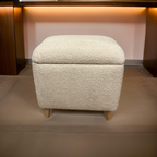cream teddy soft dressing table stool with angled wooden legs and a storage lid