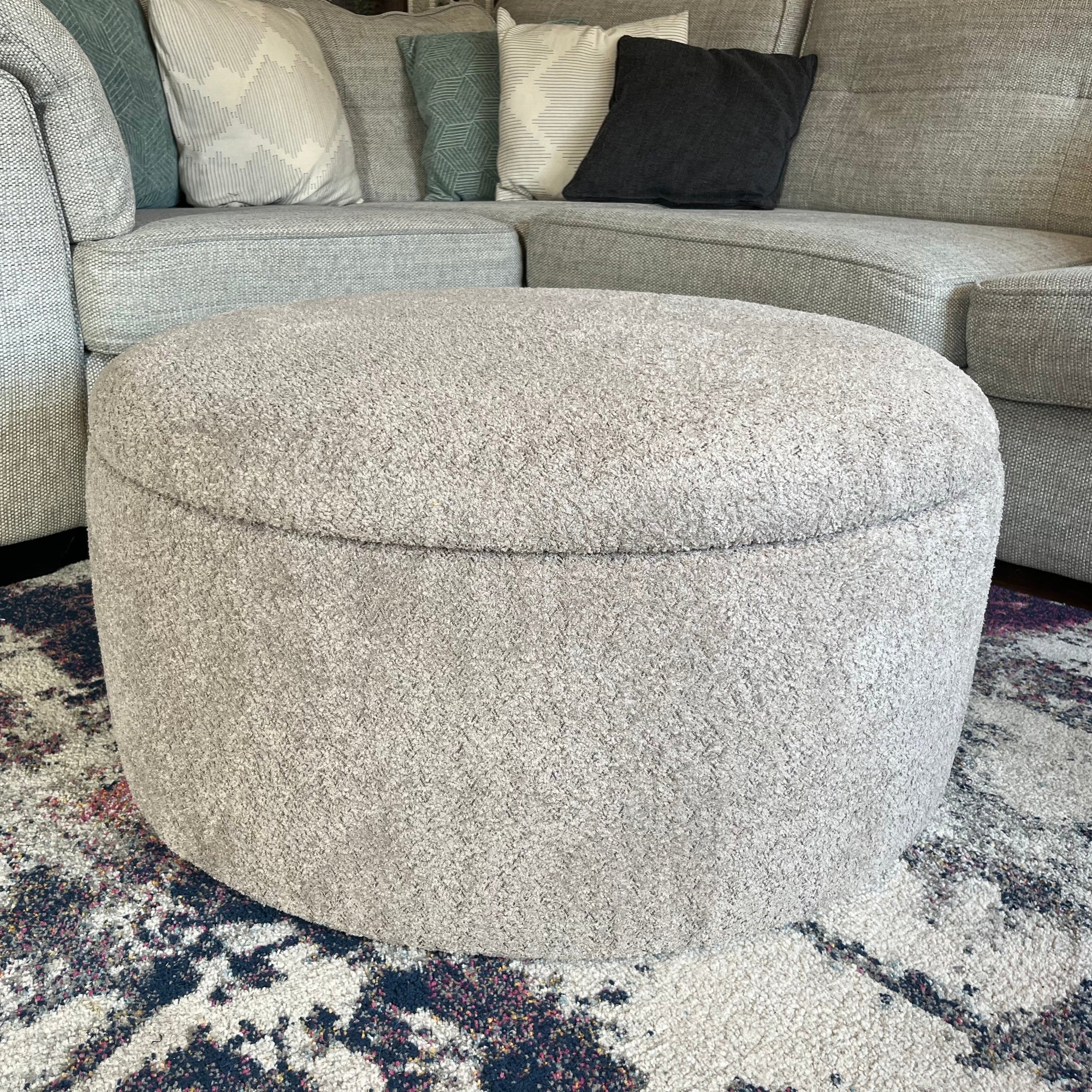 round fluffy ottoman footstool with storage in truffle greige boucle fabric