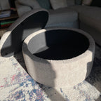 open storage ottoman footstool round with a removable lid in boucle truffle upholstered fabric