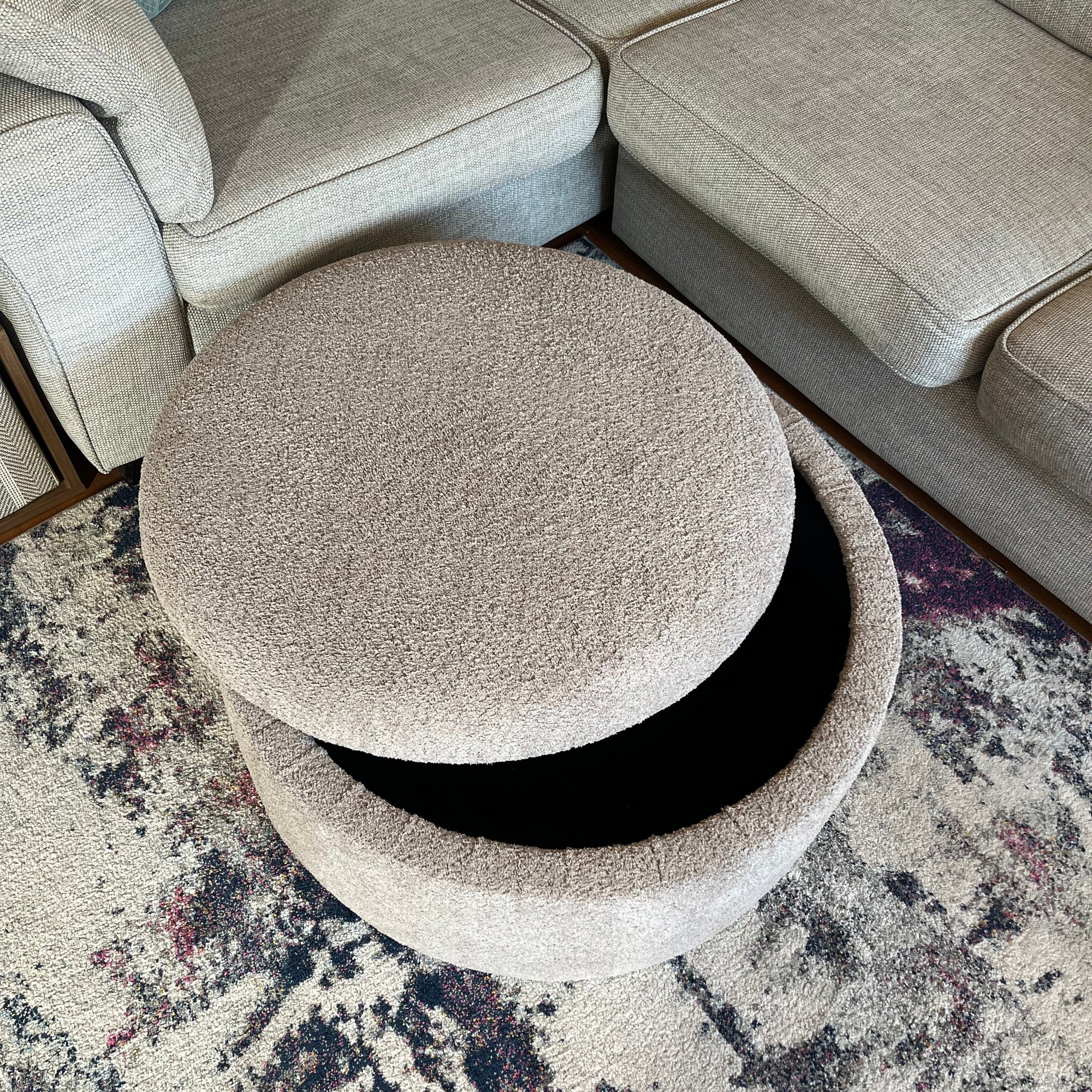partially open storage pouffe footrest with removable cushioned lid