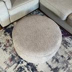 Soft round fluffy footstool with interior storage and removable lid