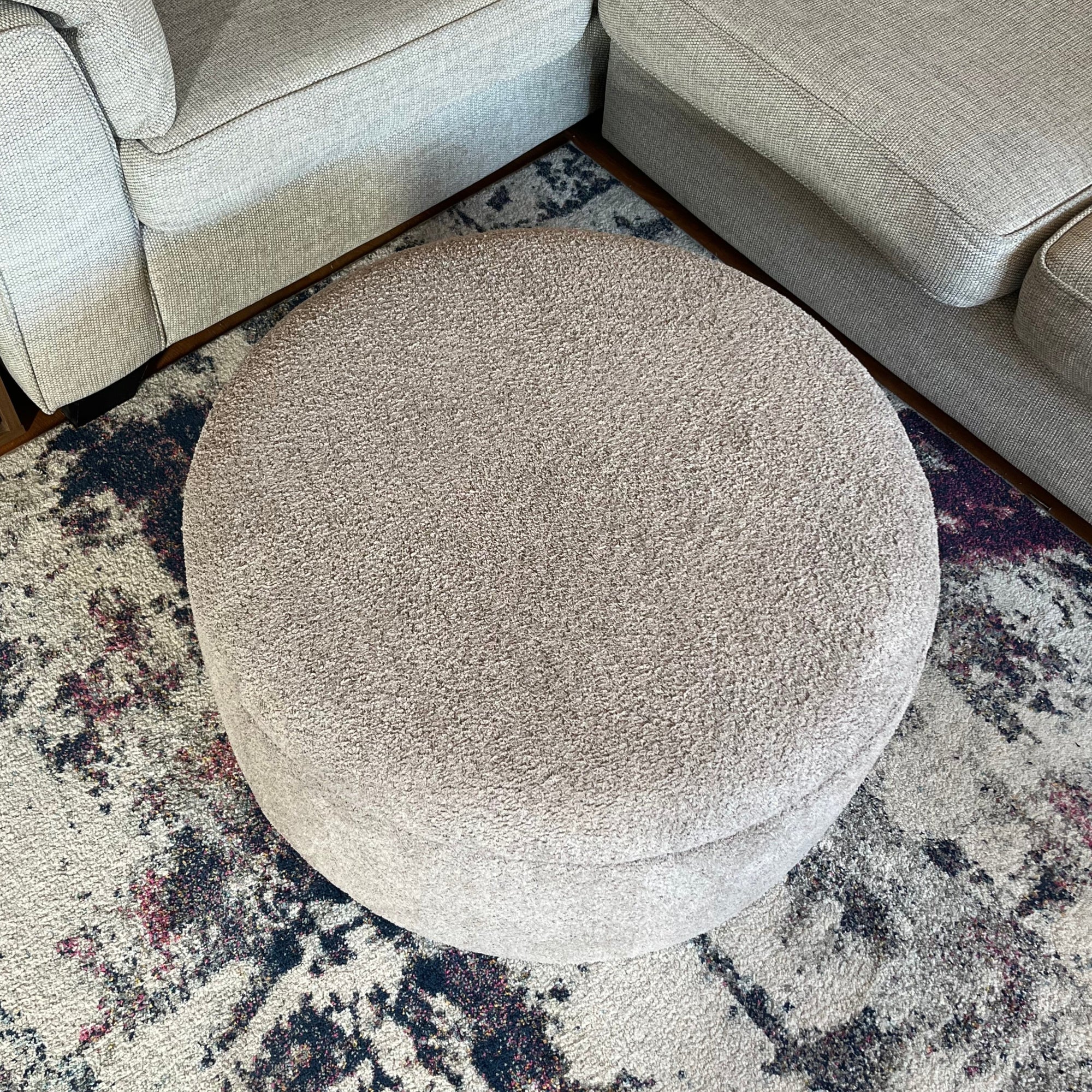 Soft round fluffy footstool with interior storage and removable lid