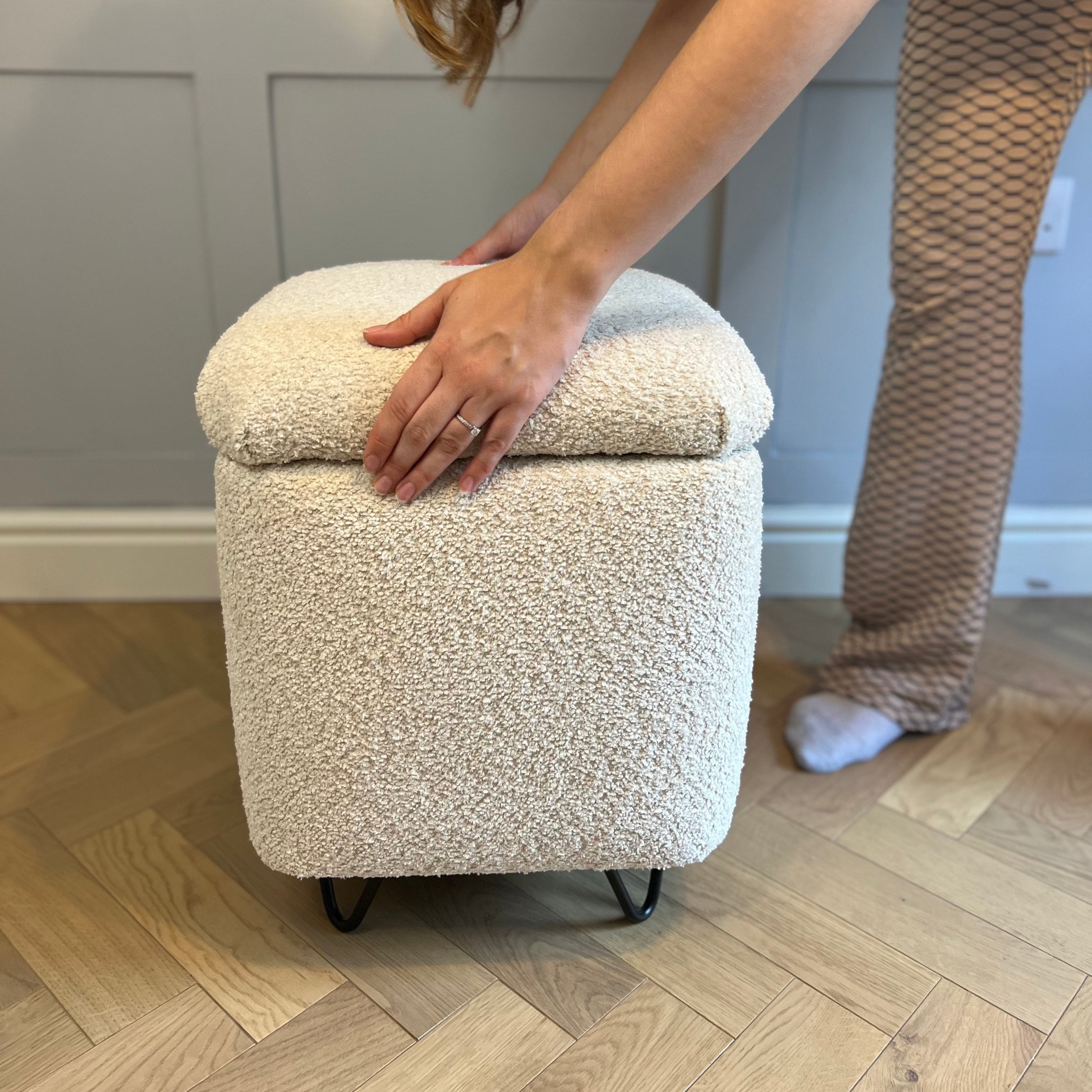 square vanity chair in boucle fabric showing a removable lid for interior storage