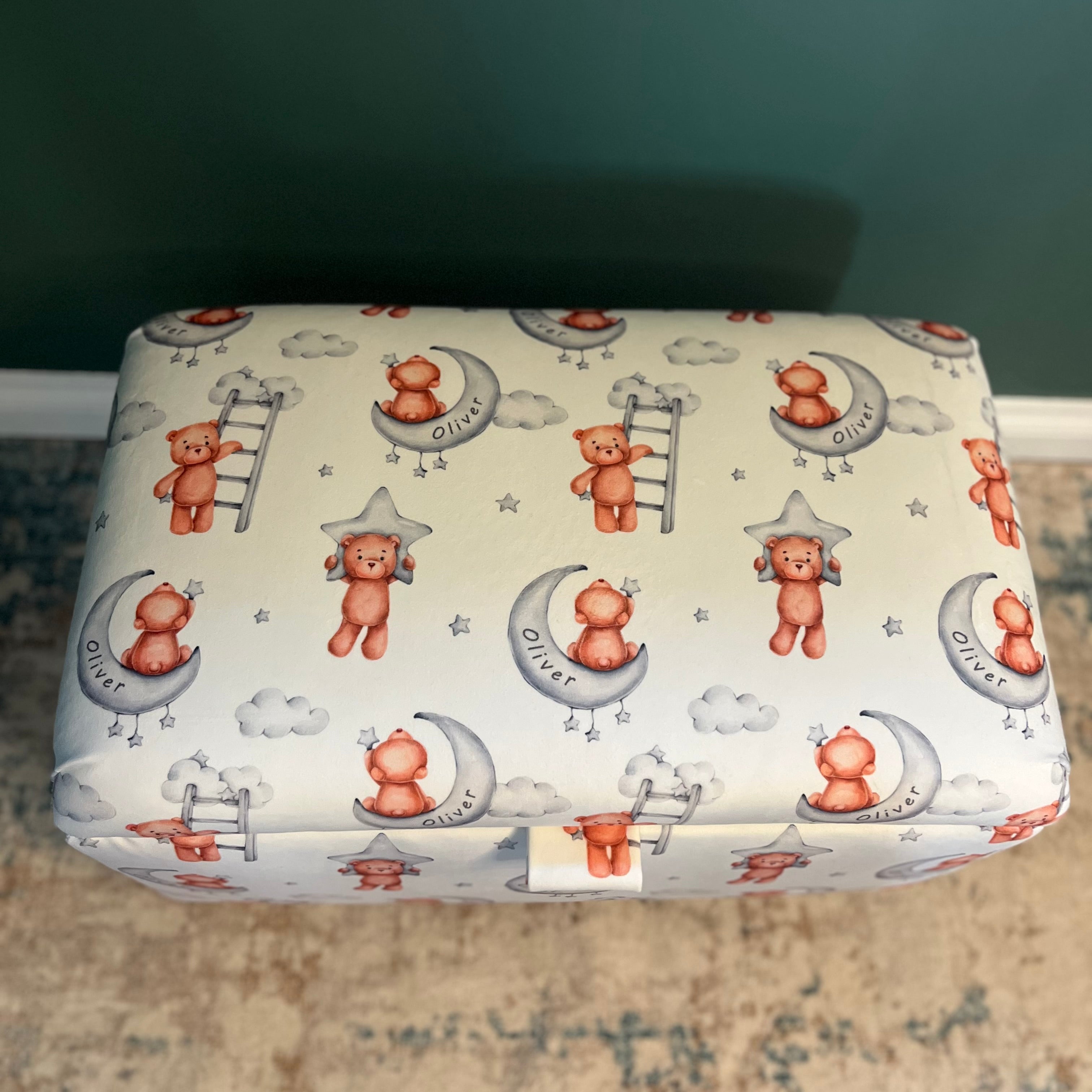 white upholstered kids storage box with bears and stars